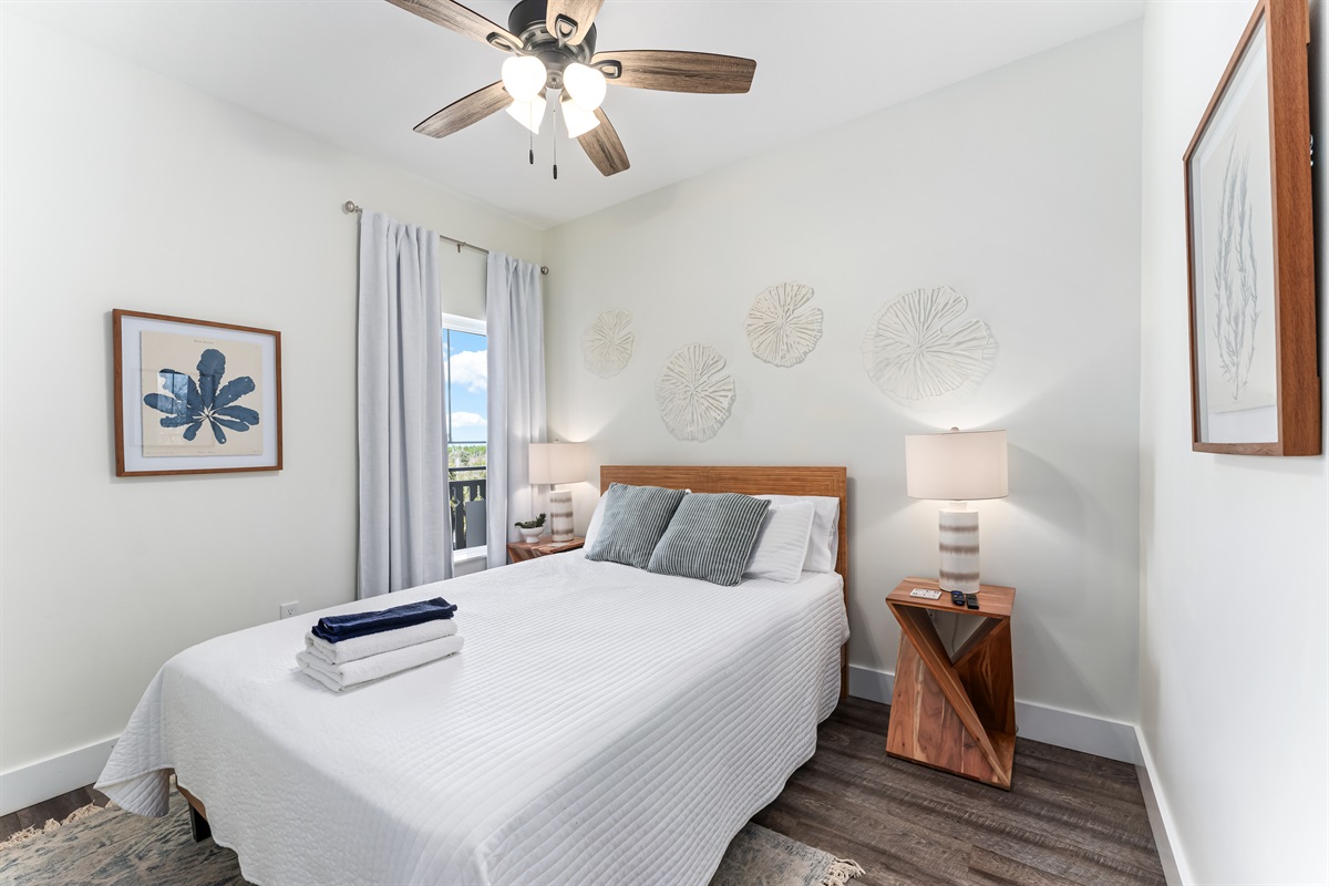 Guest bed w/ new queen mattress, mango wood side tables, USB, USBC outlets on each side of bed. Mexico Beach, FL.