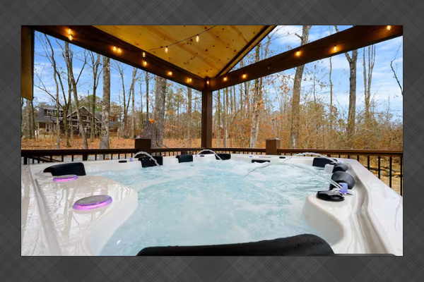 Relax under the stars in the private hot tub