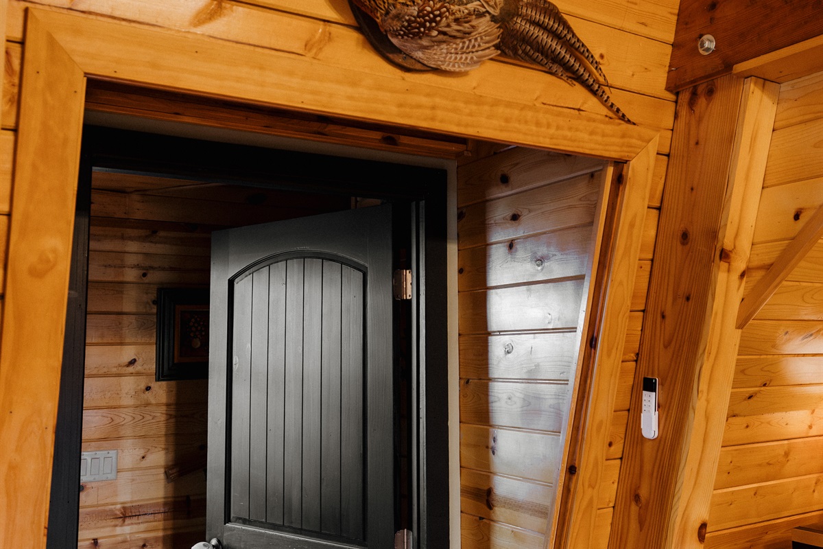 Poppywood Pines’ character shines through rustic wood beams, custom doors, and curated lodge details that create an authentic mountain cabin feel—offering a warm, one-of-a-kind A-frame stay in Arizona’s White Mountains.