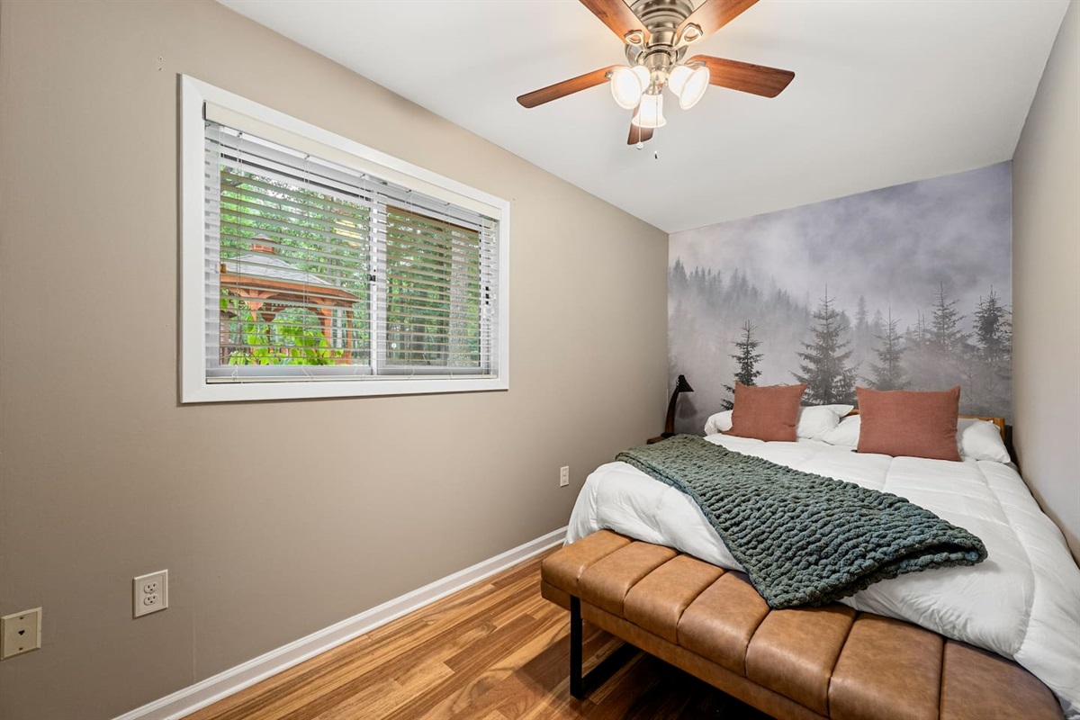 [Bedroom 3] - queen bed with a door that leads directly to the hall bathroom.