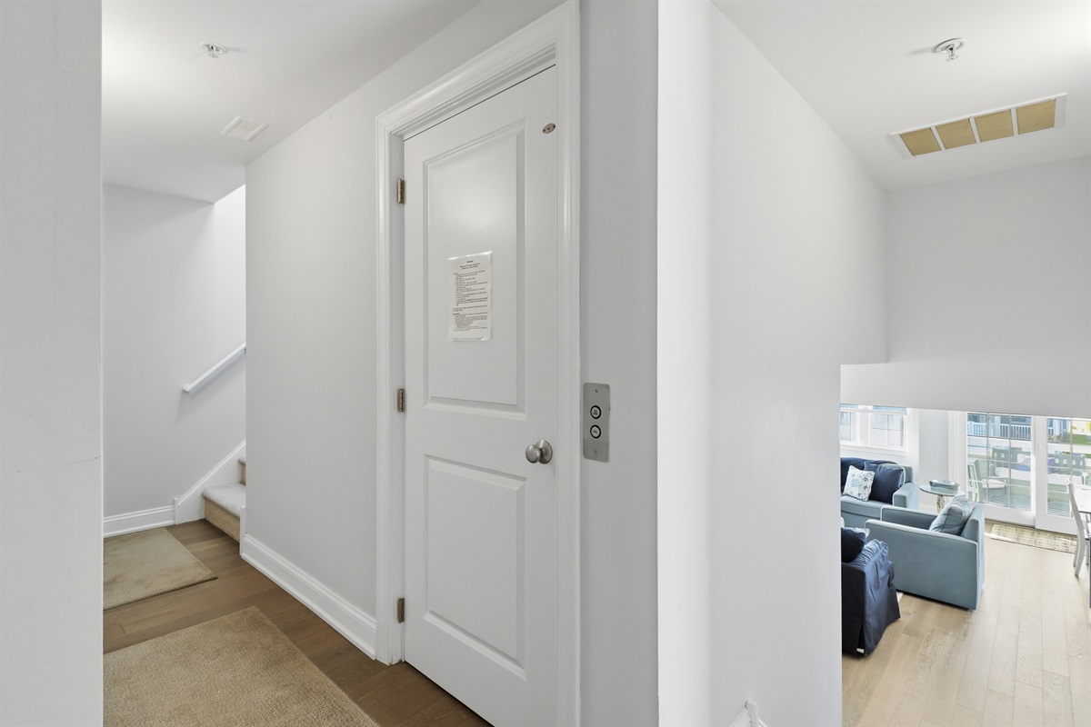 Stairs leading to the upper-level bedrooms