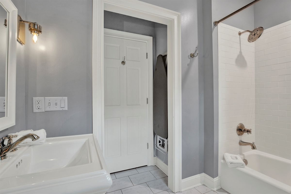 Full bath with a tub/shower combo to refresh after a long day.