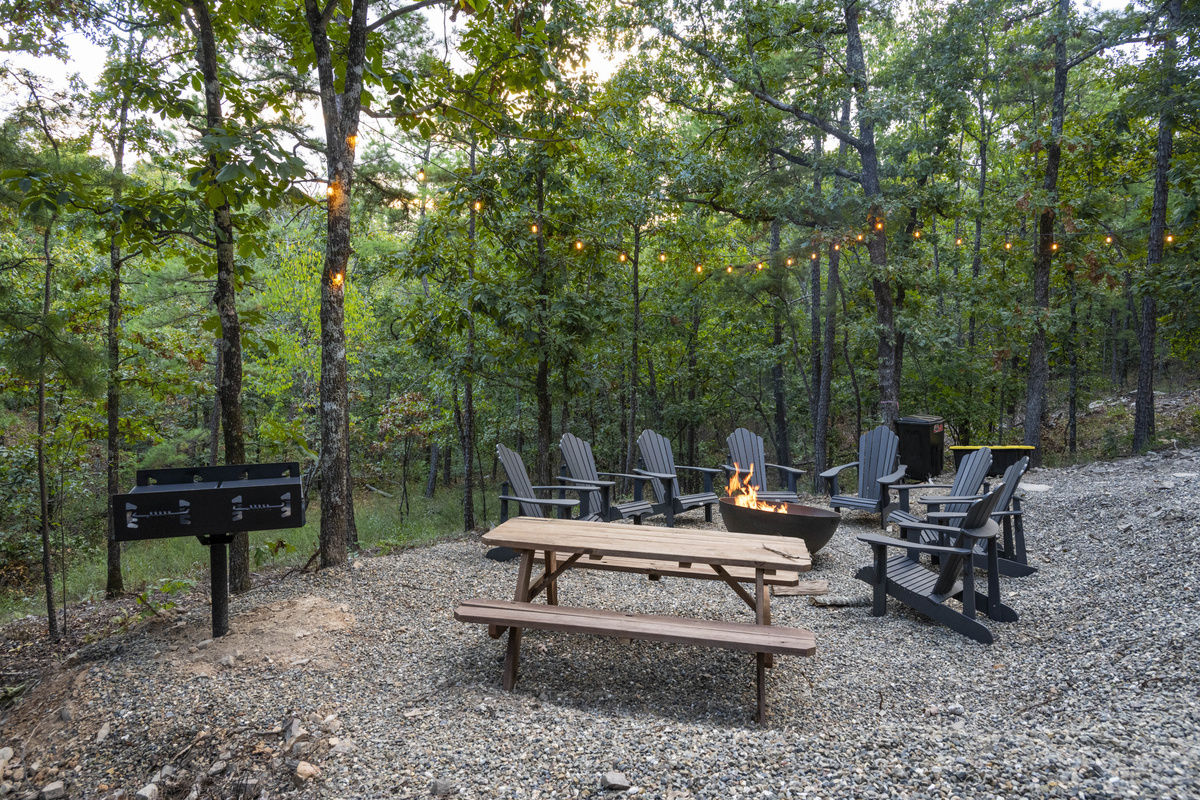 Enjoy the fire pit for creating unforgettable evenings beneath the shimmering twinkle lights.