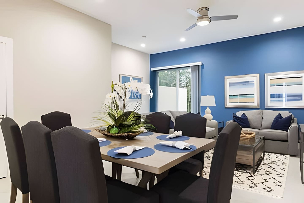 Gather around this elegant dining table to share family meals.