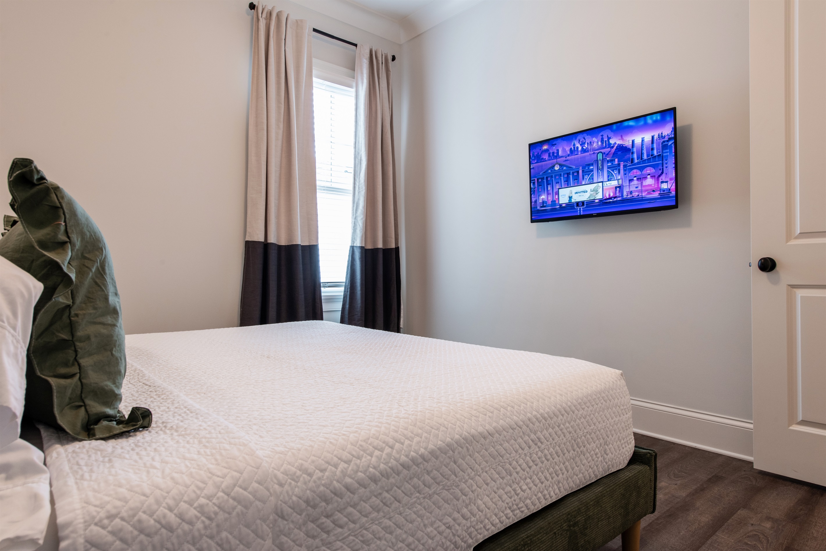 A comfy bed with soft sheets, fluffy pillows, and a cozy vibe!