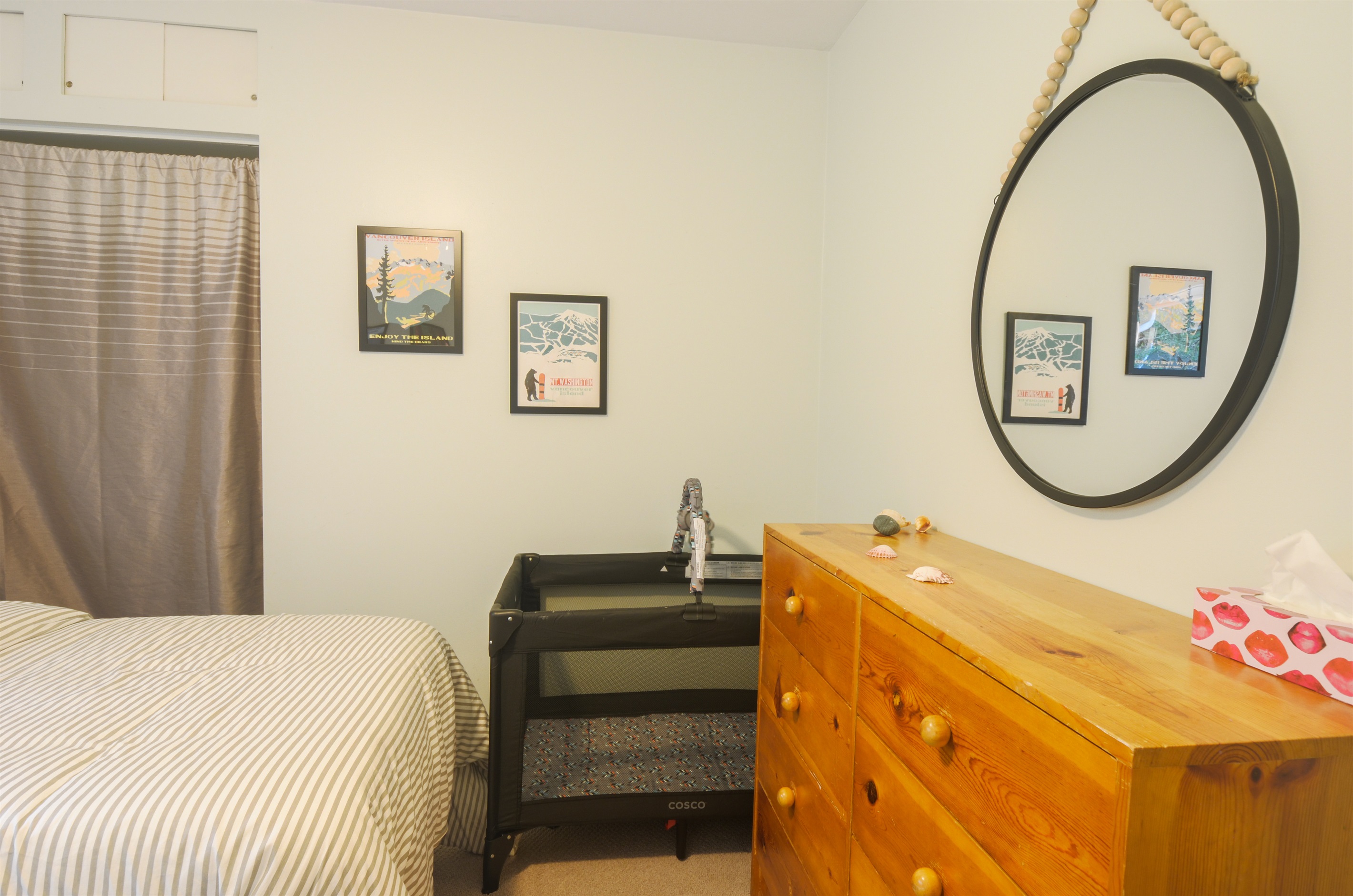 Playpen and changing area in spare bedroom