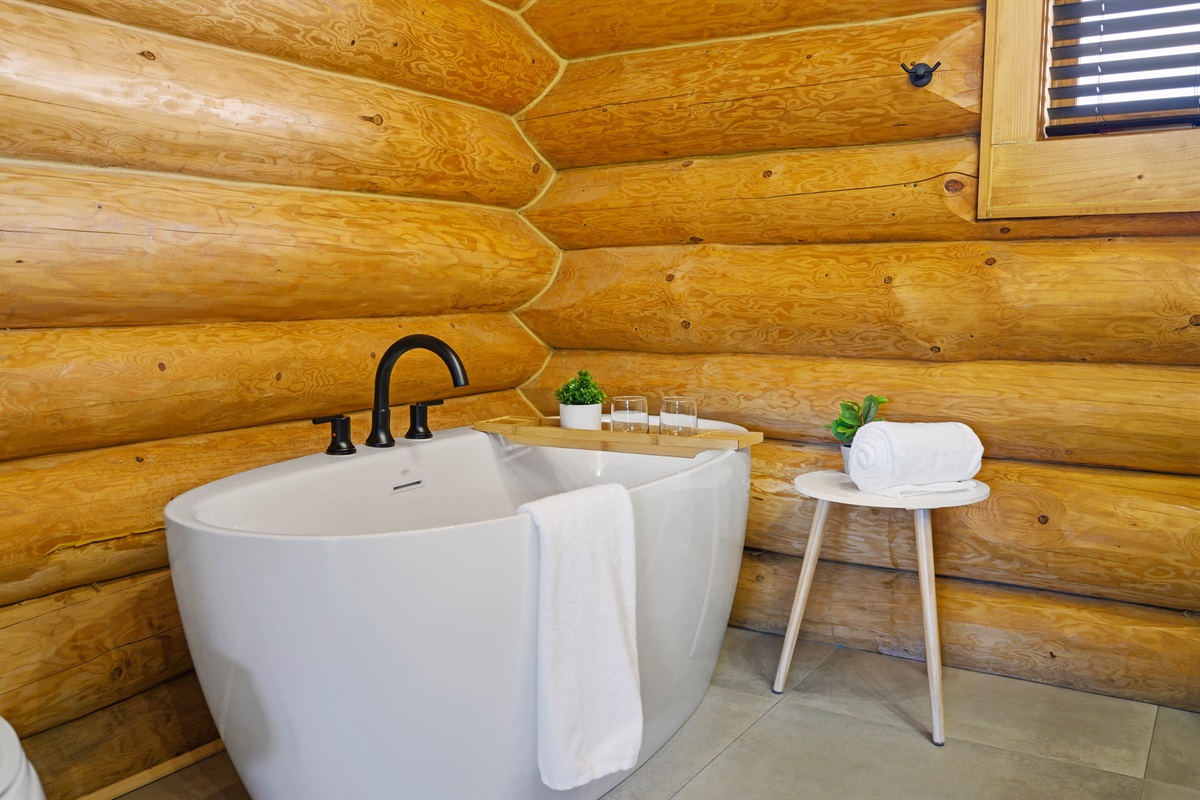 Main level bathtub to relax in