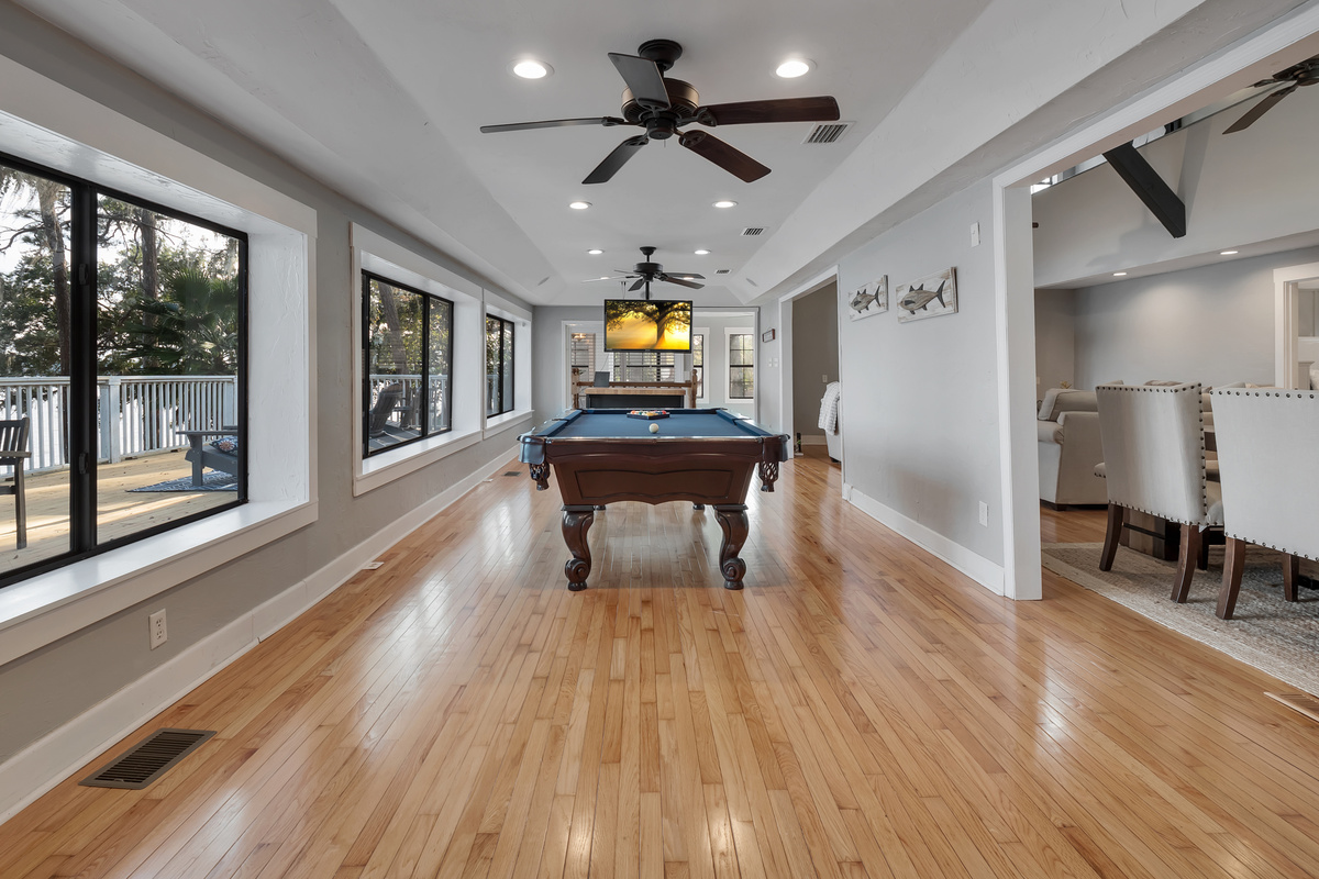 Pool table, lake view, stool seating, tv