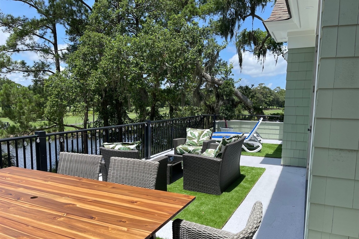 2nd floor balcony.   Eat. Sit, or Tan