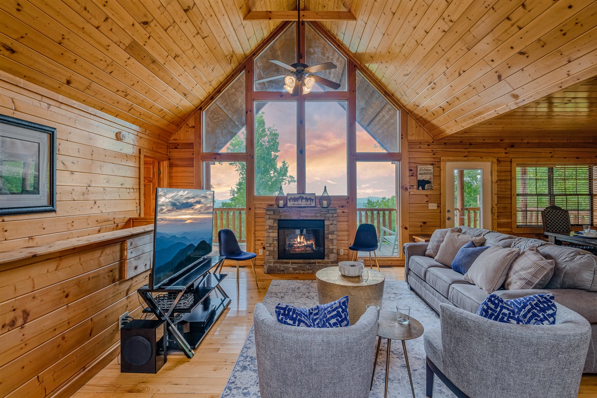 Unwind in the tranquil living room by the fire place after a day out in the beautiful Smoky Mountains.