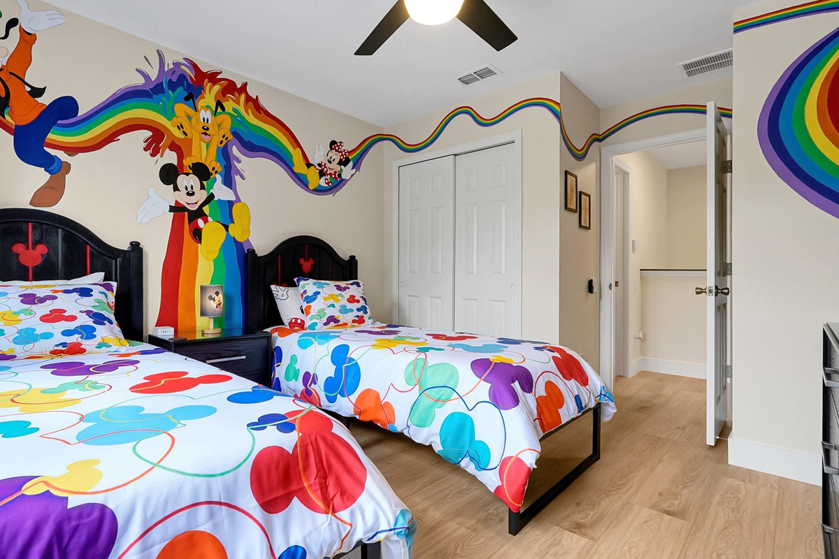 Mickey’s Rainbow Magic – Two twin beds and hand-painted wraparound mural
