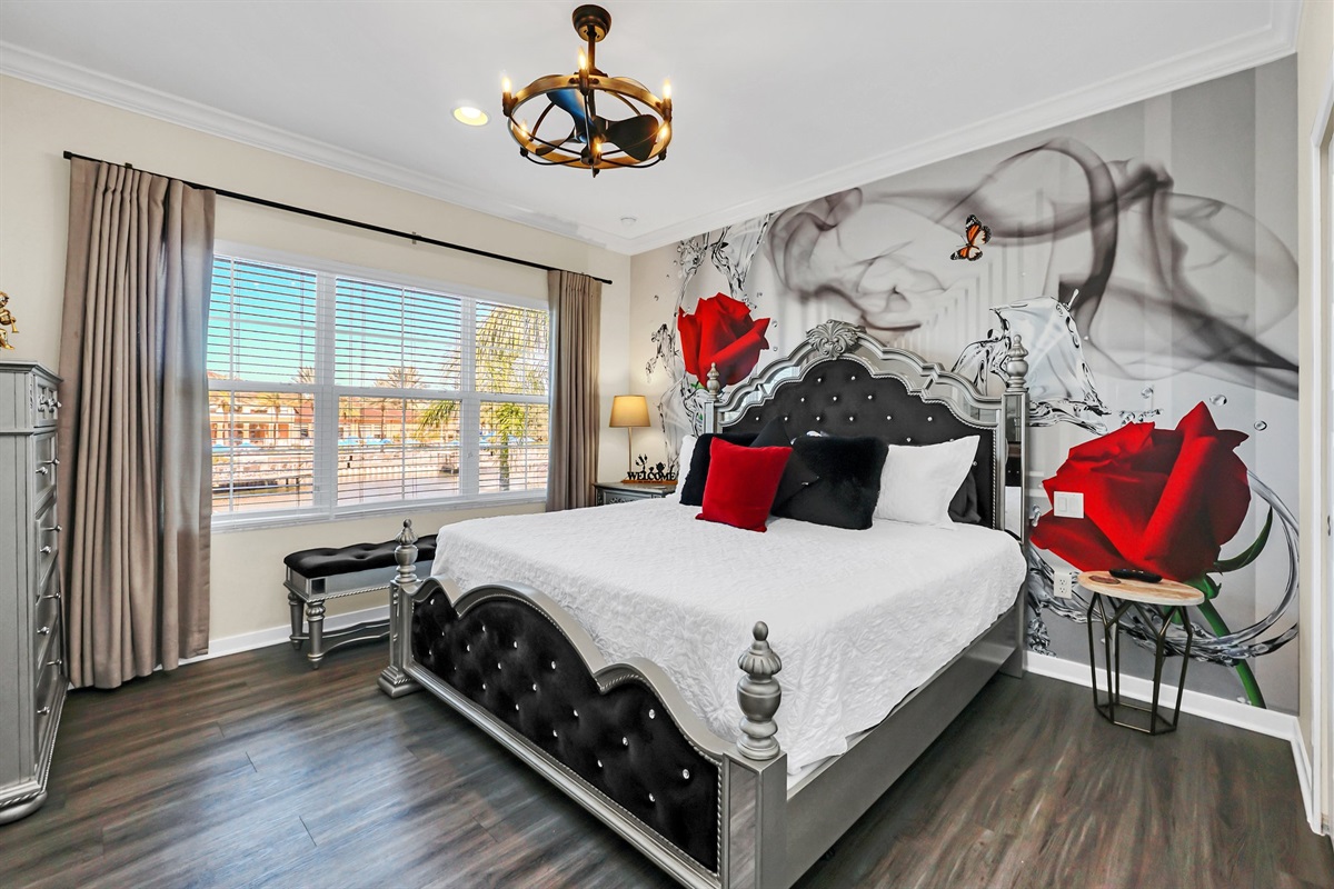 Primary bedroom with luxurious king bed