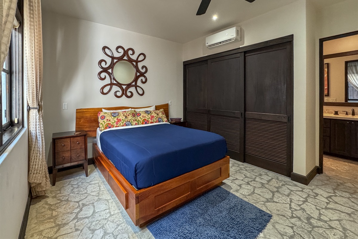 Secondary bedroom with queen bed.