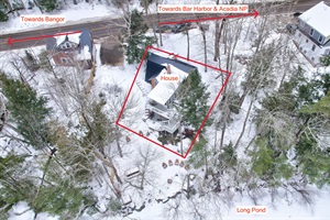 The lake house, and State Route 46 in the winter. State Route 46 is a state road that is plowed and maintained year round.