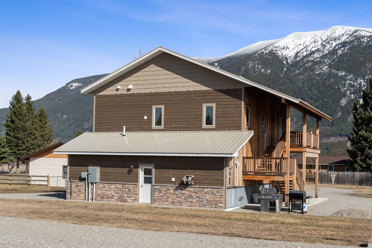 Enjoy sweeping  views of Columbia Mountain while steaks sizzle on the grill