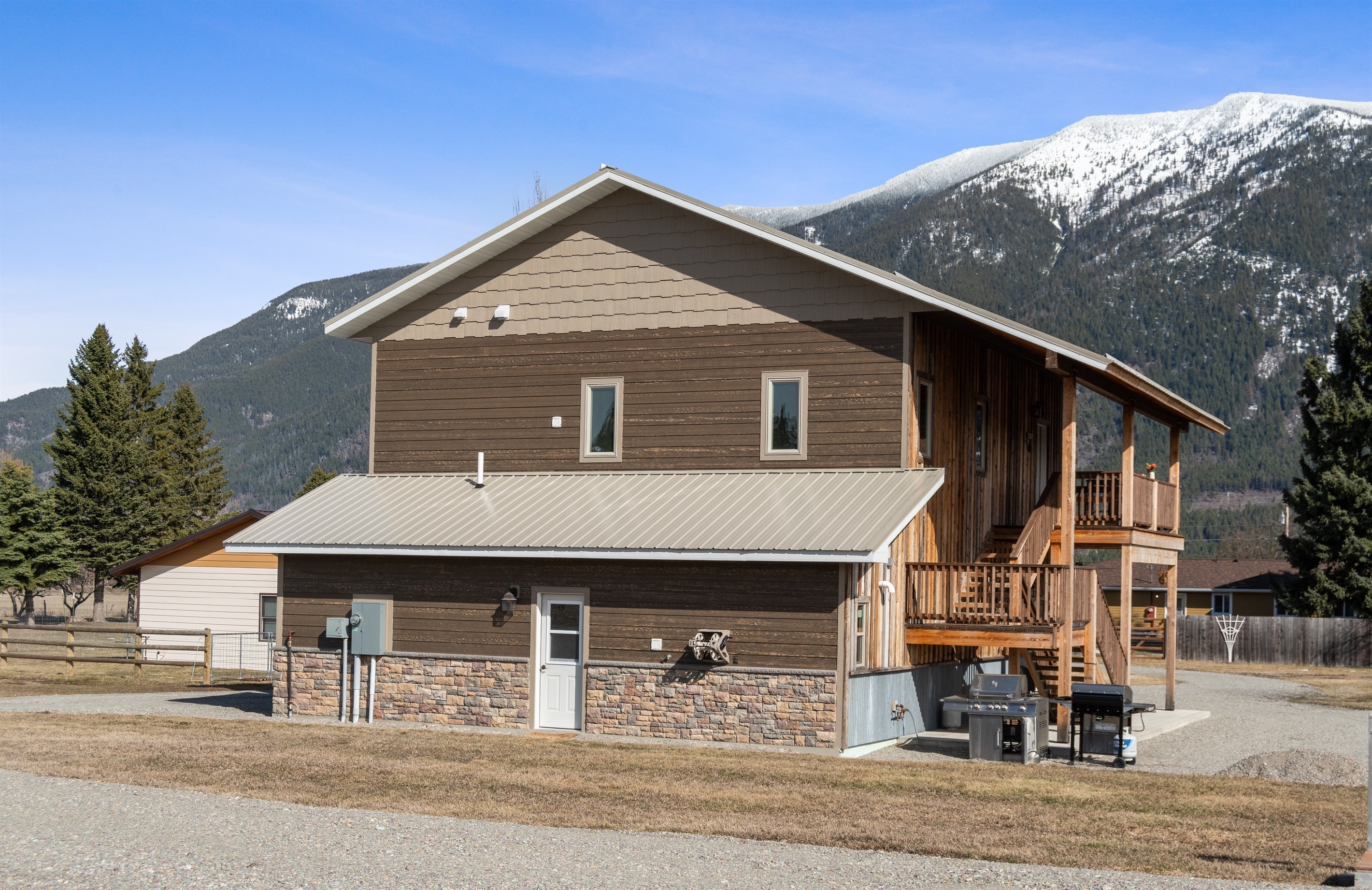 Enjoy sweeping  views of Columbia Mountain while steaks sizzle on the grill