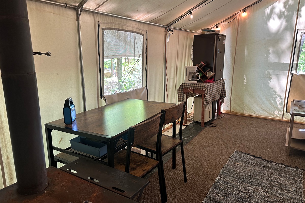 Dining area inside the homestead tent
