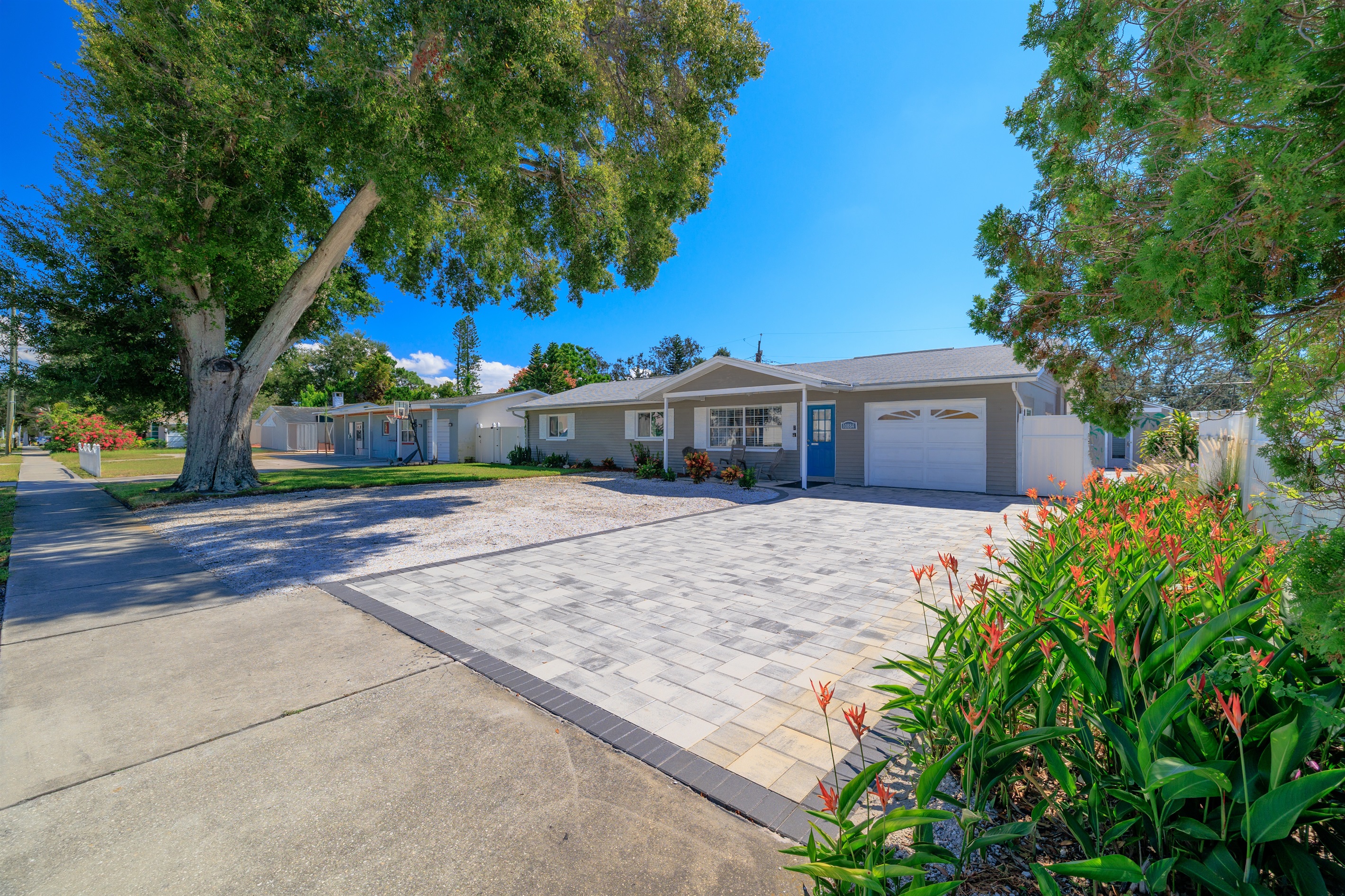 Beautiful paved driveway and walkway with extra stone area for up to 7 vehicles!