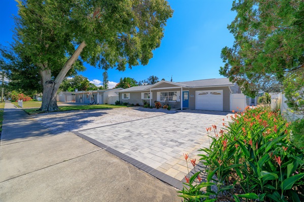Beautiful paved driveway and walkway with extra stone area for up to 7 vehicles!