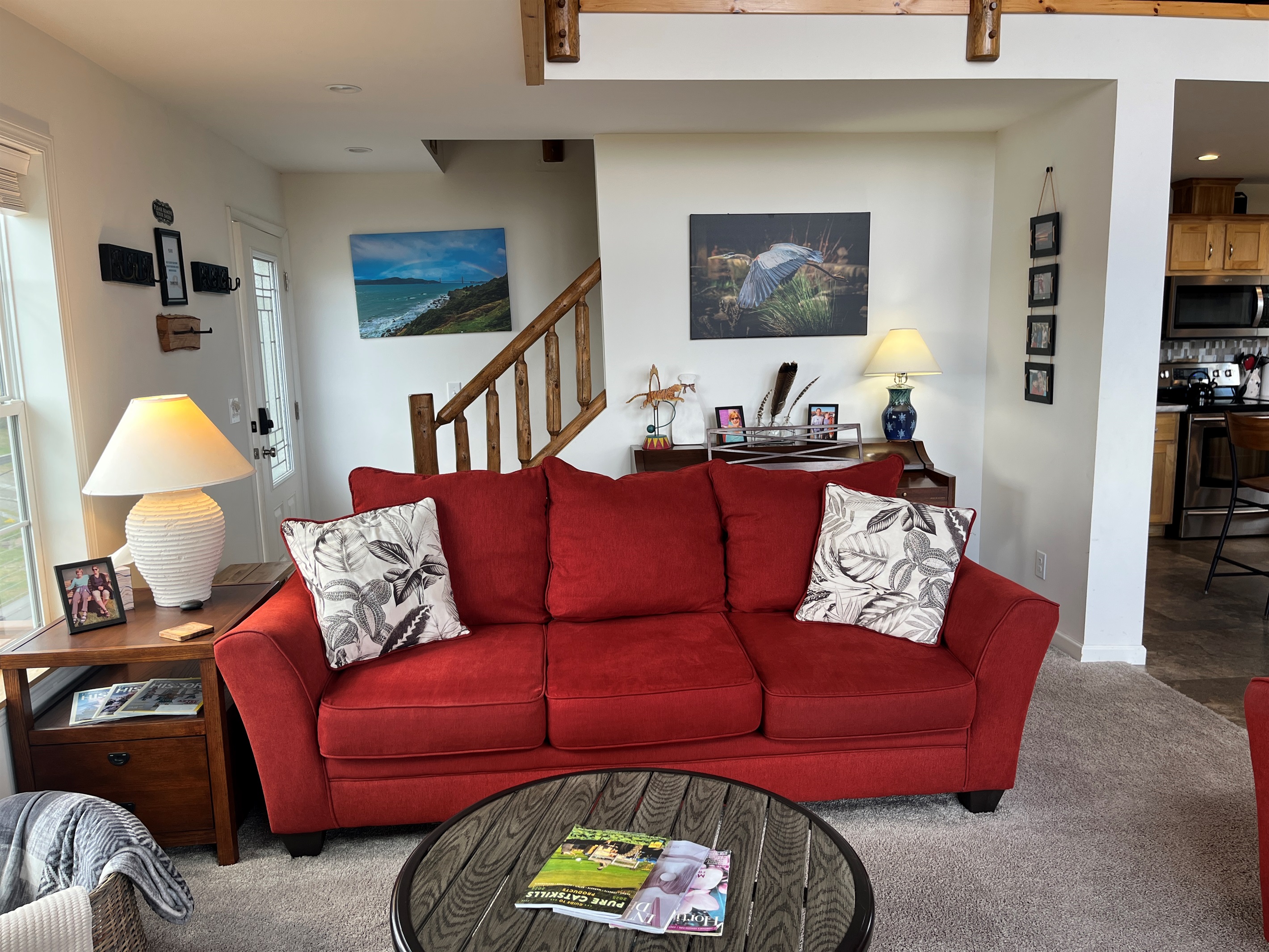 Living area with stairs to game loft