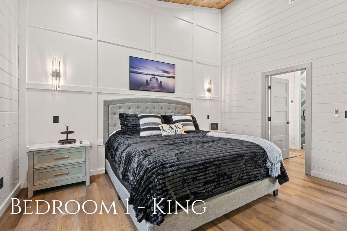 This king bedroom offers a cozy retreat with soft bedding, gentle lighting, and peaceful views to start and end your day in comfort.