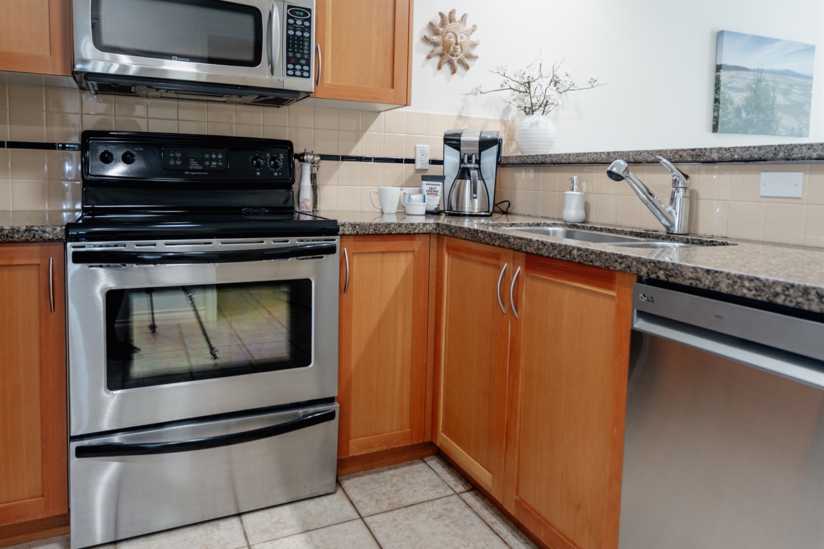 Unit A Modern Fully stocked Kitchen.