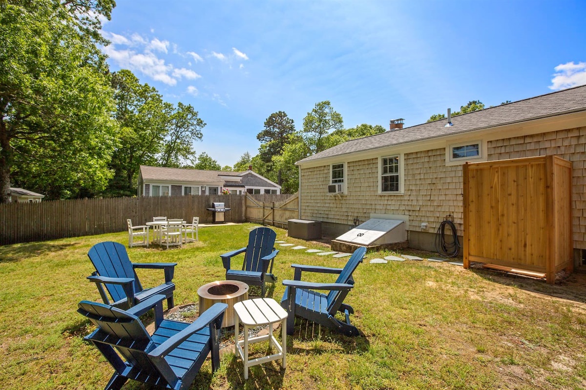 Whether you’re sipping coffee in the sun or gathering ‘round the fire pit after a beach day, this fully fenced backyard was made for memory-making. 