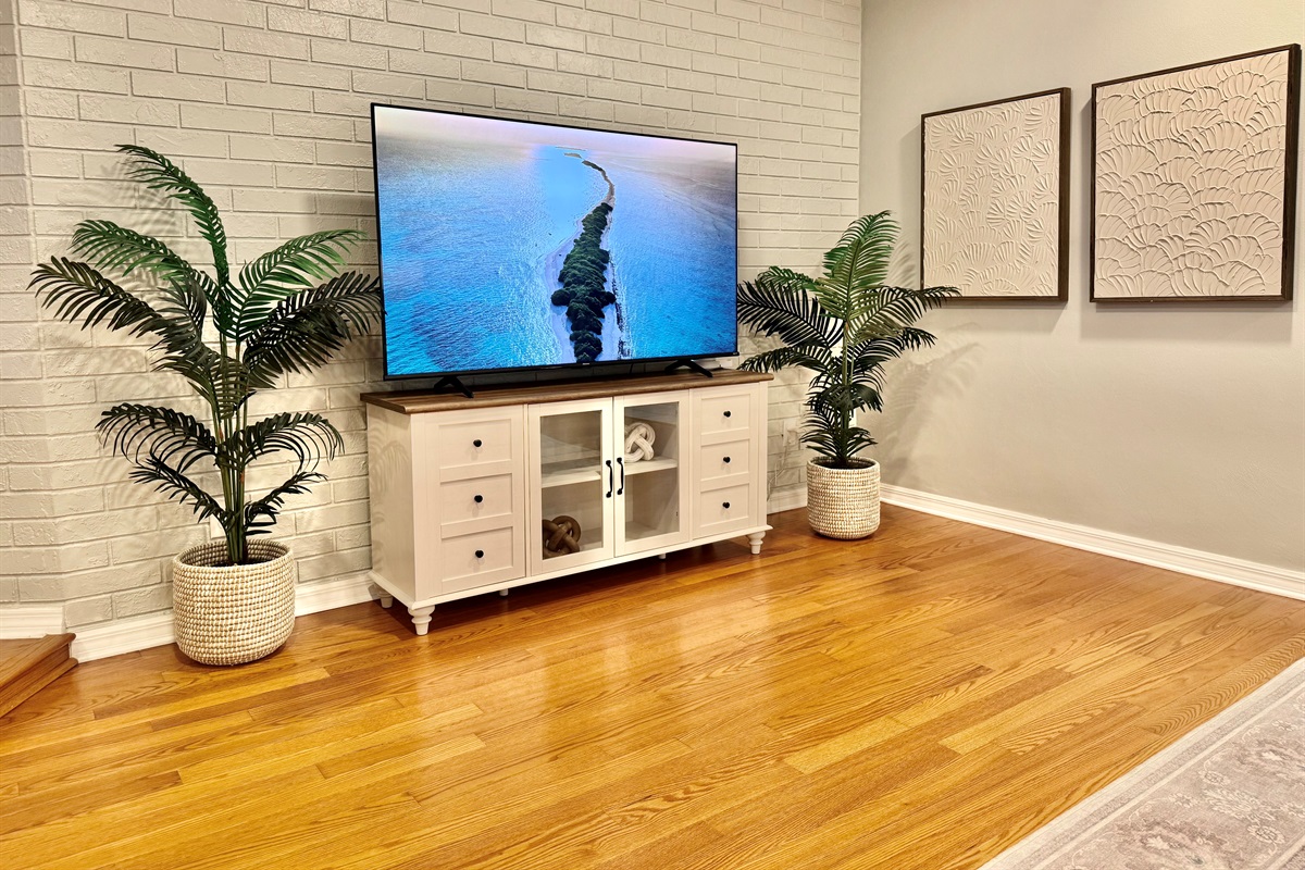 Catch up on your favorite shows on the smart TV or enjoy conversation in this beautifully designed open-concept living space.