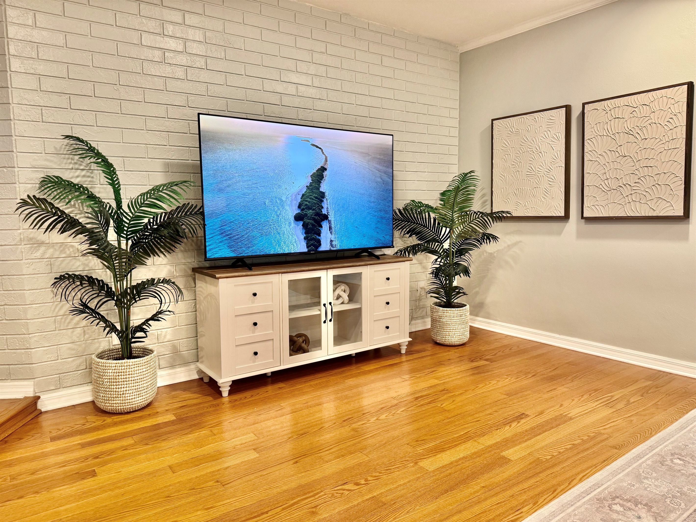 Catch up on your favorite shows on the smart TV or enjoy conversation in this beautifully designed open-concept living space.