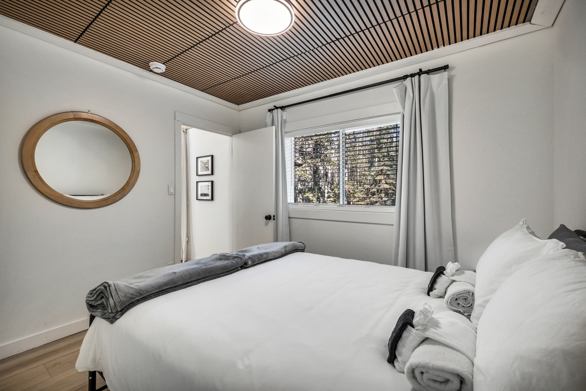 Settle into the cozy QUEEN bedroom, a calm and comfortable retreat after a day of lake time, exploring, or relaxing at the cabin.