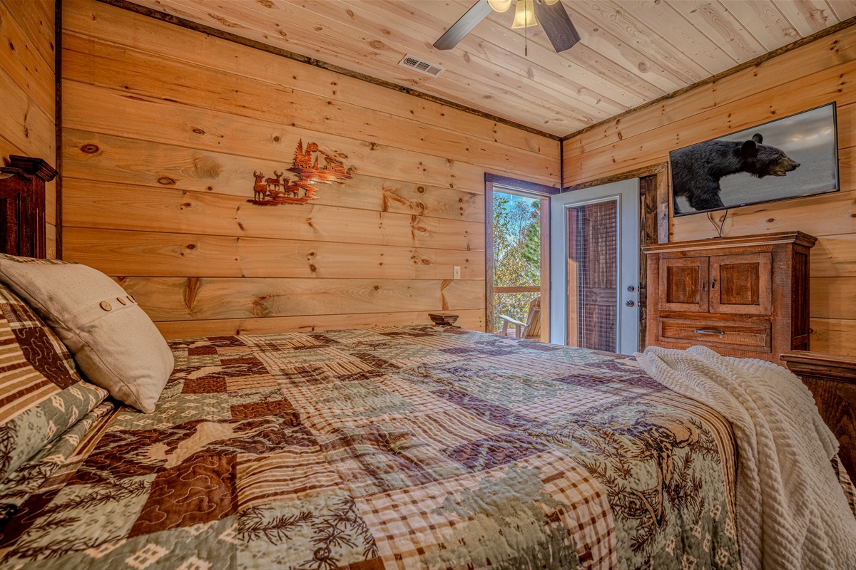 Spacious king suite with large TV and access to the deck.”