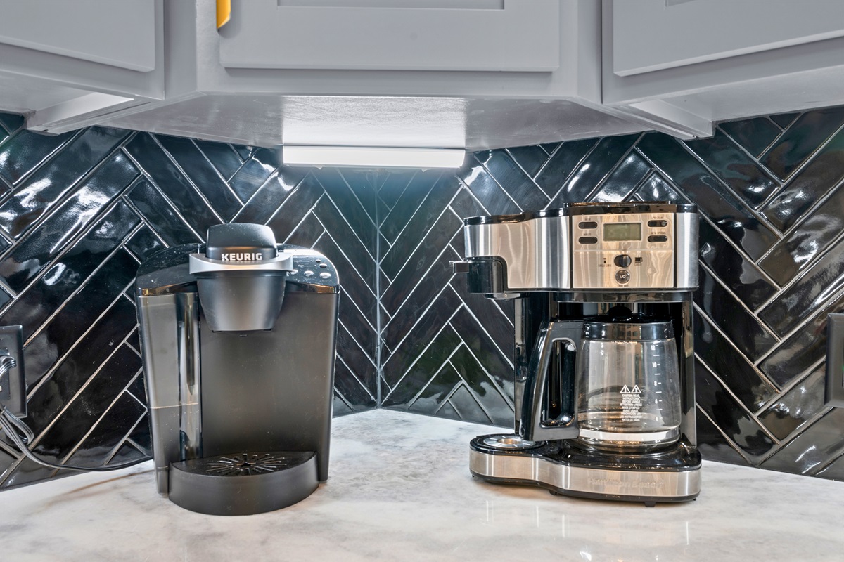 A convenient coffee station and countertop appliances make it easy to start the morning with a fresh cup before heading out for the day.