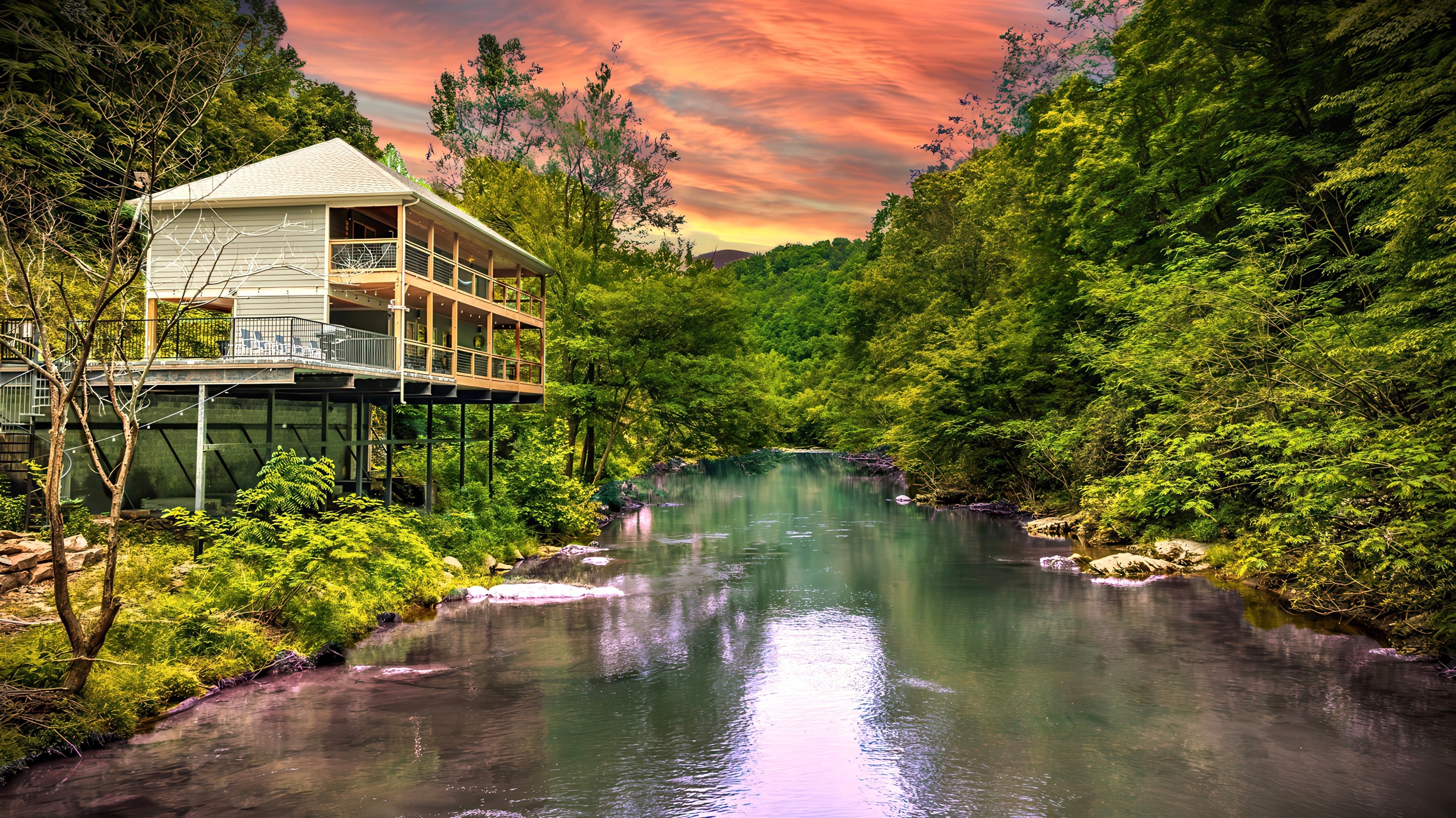Welcome to "Take Me to the River" Cabin. Perched right above the famous "Little Pigeon River" in Gatlinburg. Ready for you + your loved ones listening to the peaceful sound of nature & river stream rushing beneath you.