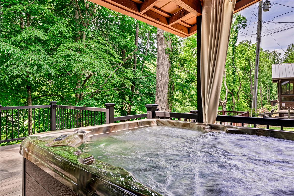 Hot tub with privacy curtains to use as you wish...