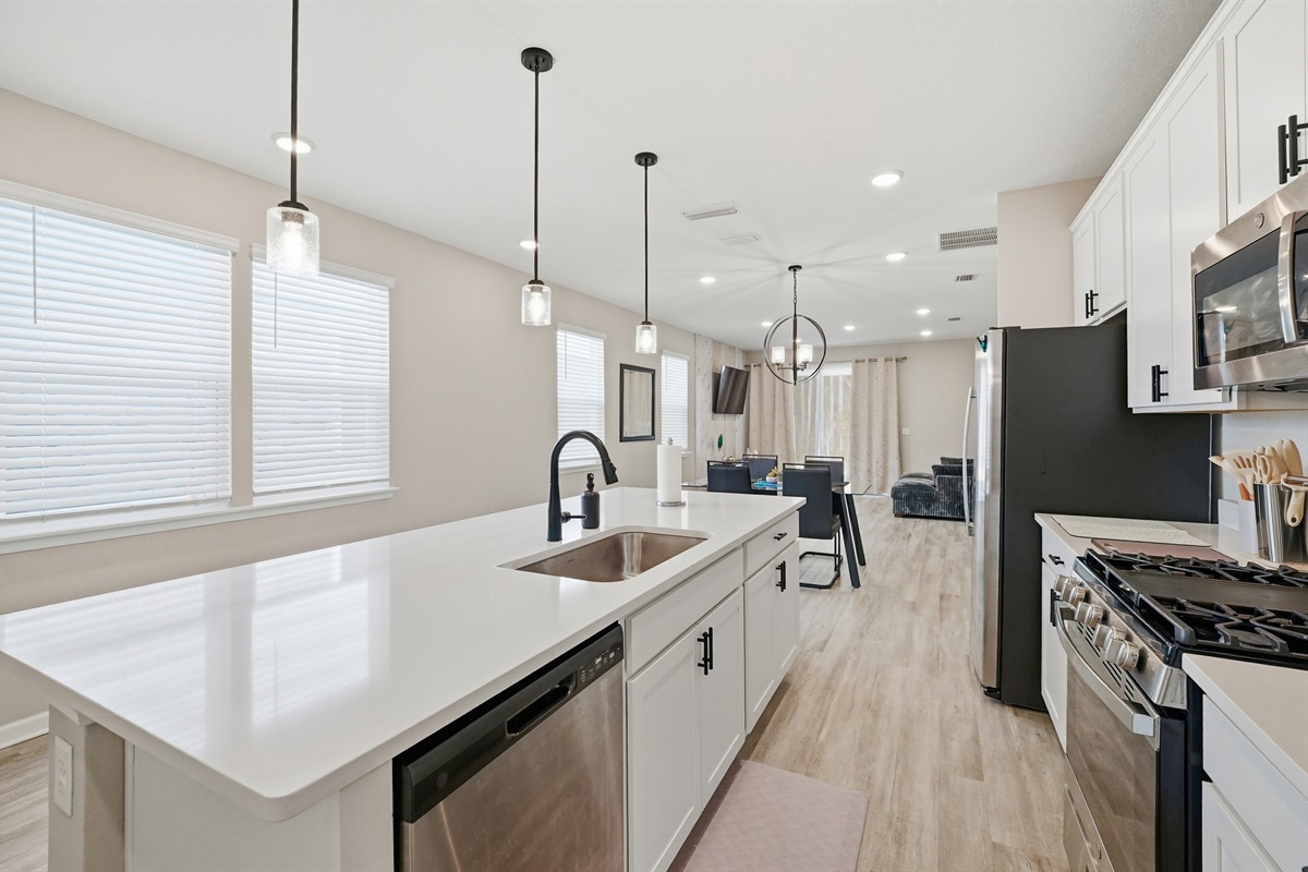 Full view of the kitchen into the living area.
