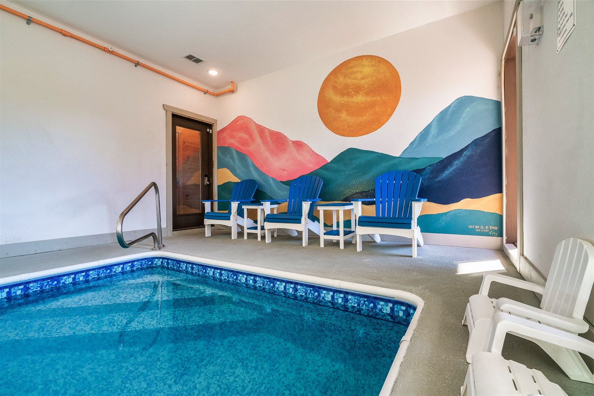 Admire the custom mural that reflects the beautiful mountains outside