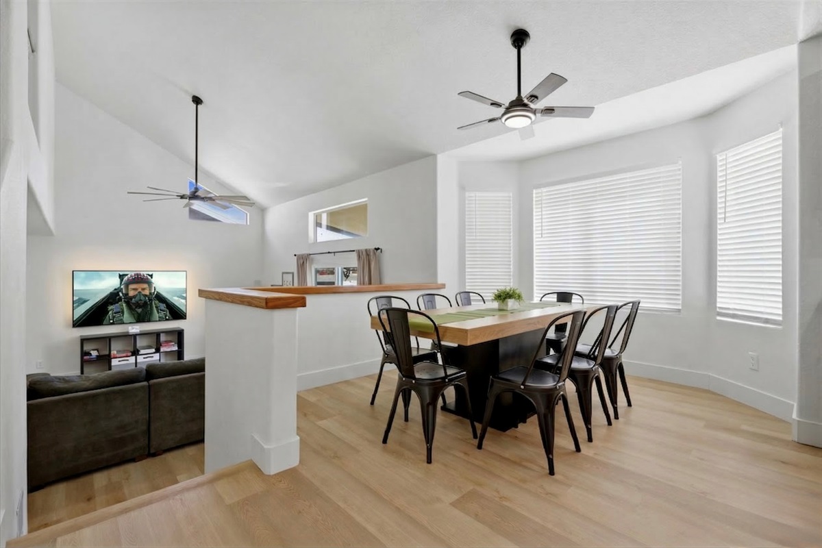 View from kitchen/dining area; family room is in the background.