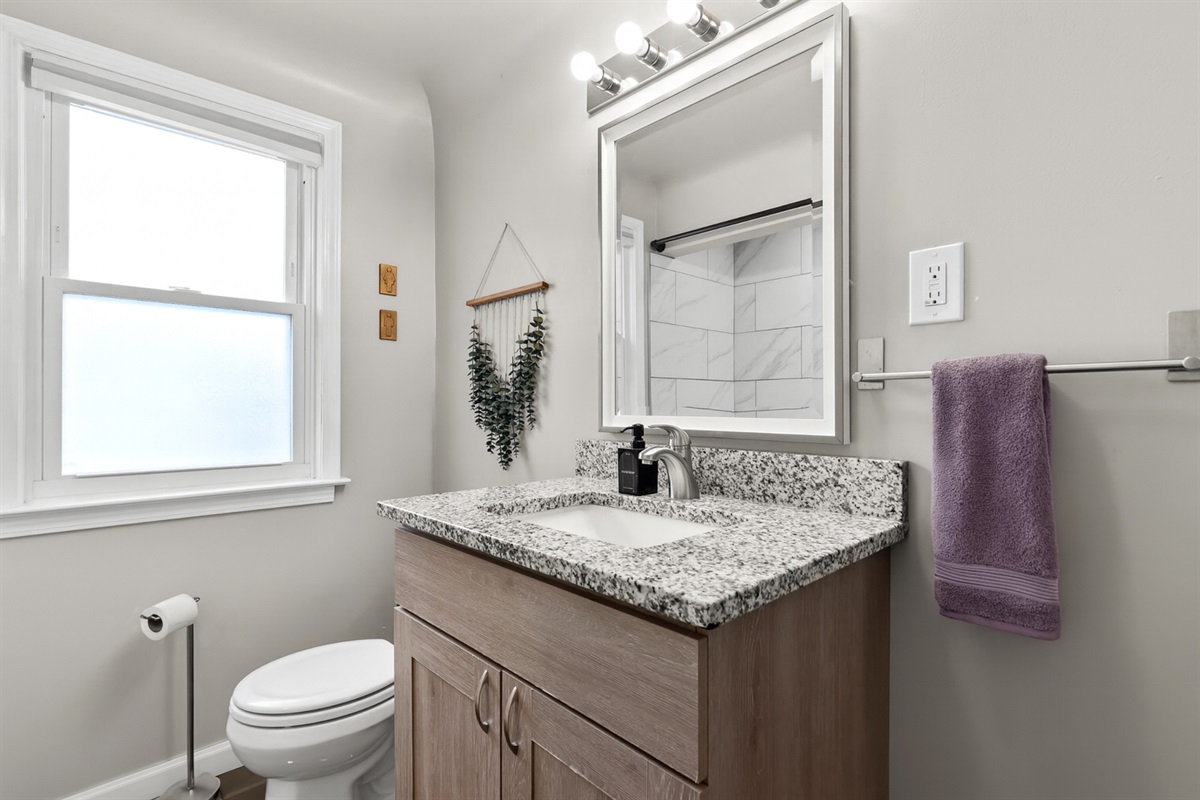 Granite counter tops provides extra storage for bathroom essentials