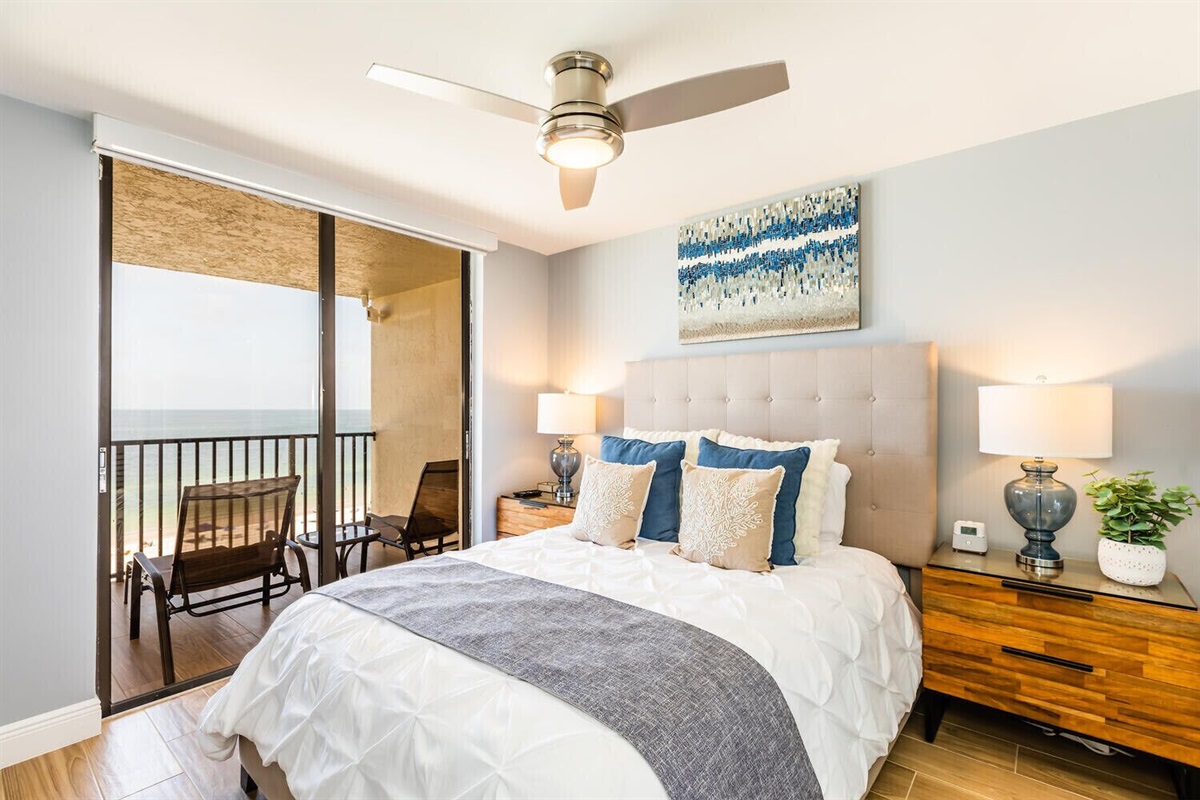 Queen bed, black out shade on the slider & Large Smart TV on wall