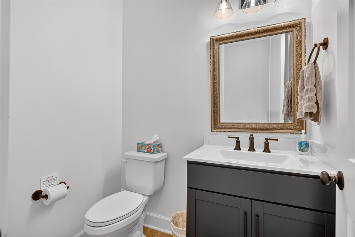 A stylish and convenient half bath located on the main level, perfect for guests during your stay.