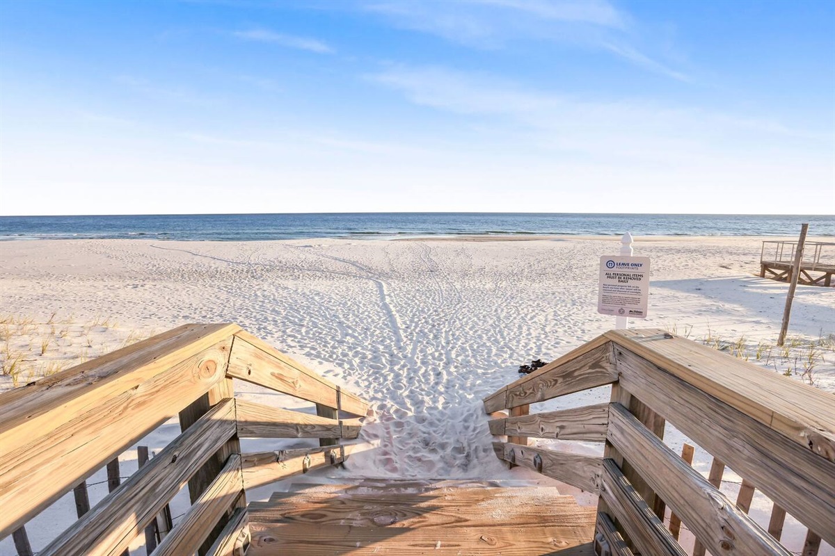 The beach is just a few steps away, with private access right across the street. The boardwalk offers seating at both ends, perfect for relaxing while you take in the view or enjoy a sunset.