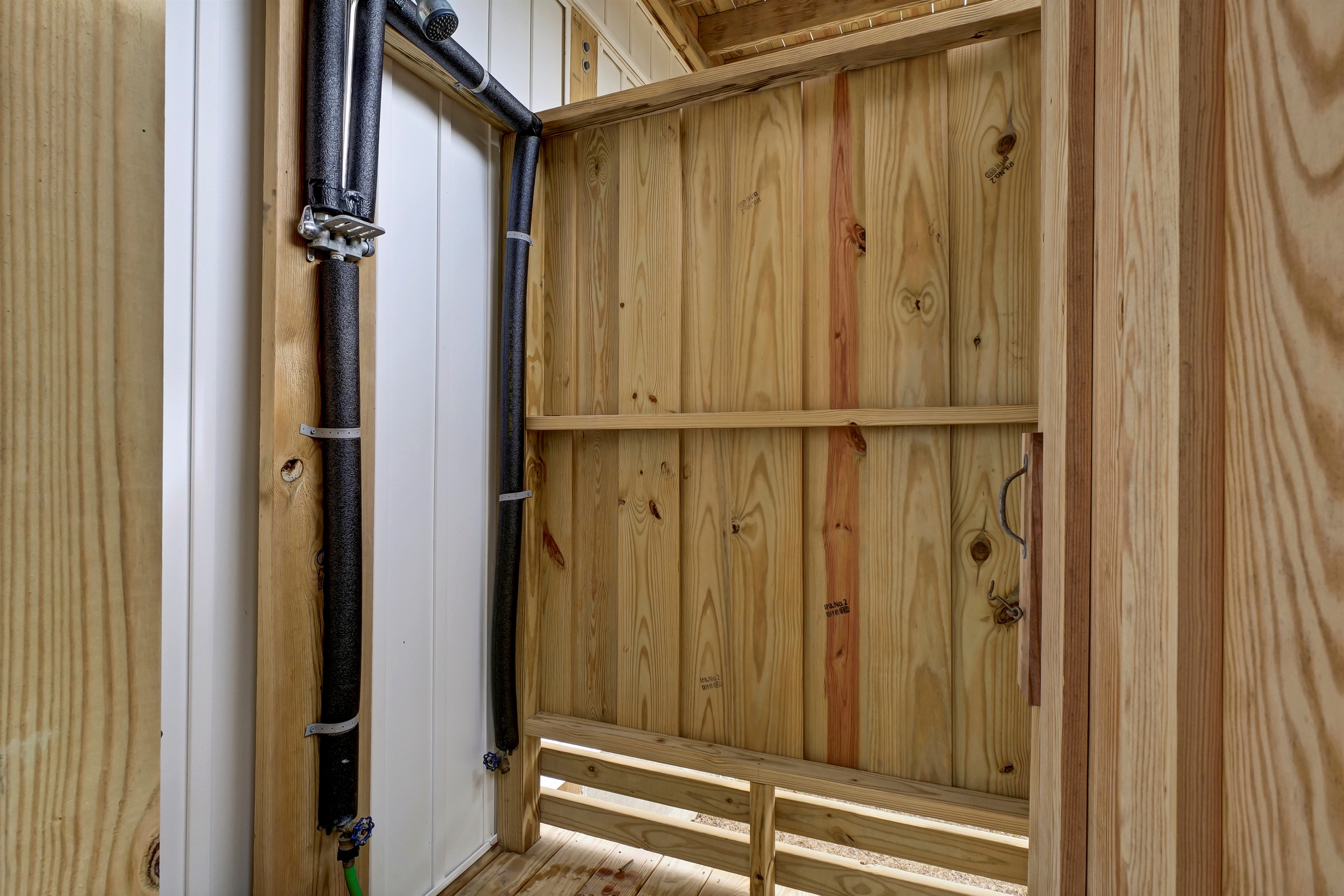 After a day of fun in the sun and sand, rinse off in the refreshing outdoor shower