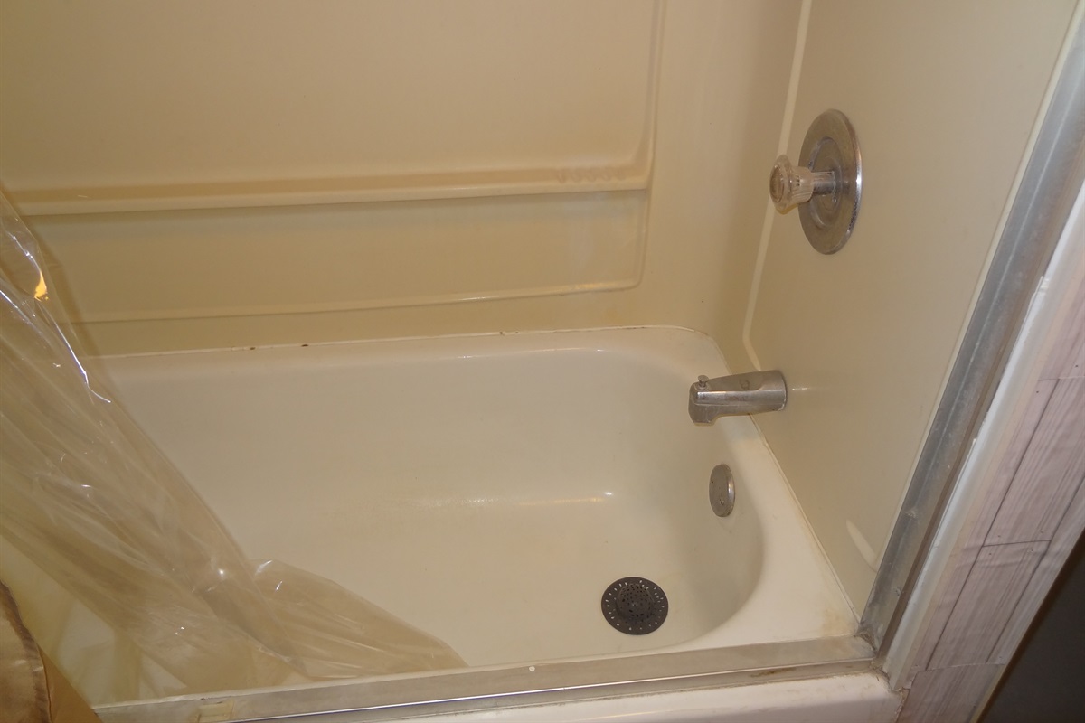 Basement bathroom with tub/shower