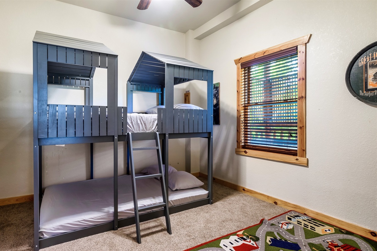 Playful bunk bed room built for imagination, giggles, and unforgettable sleepovers.