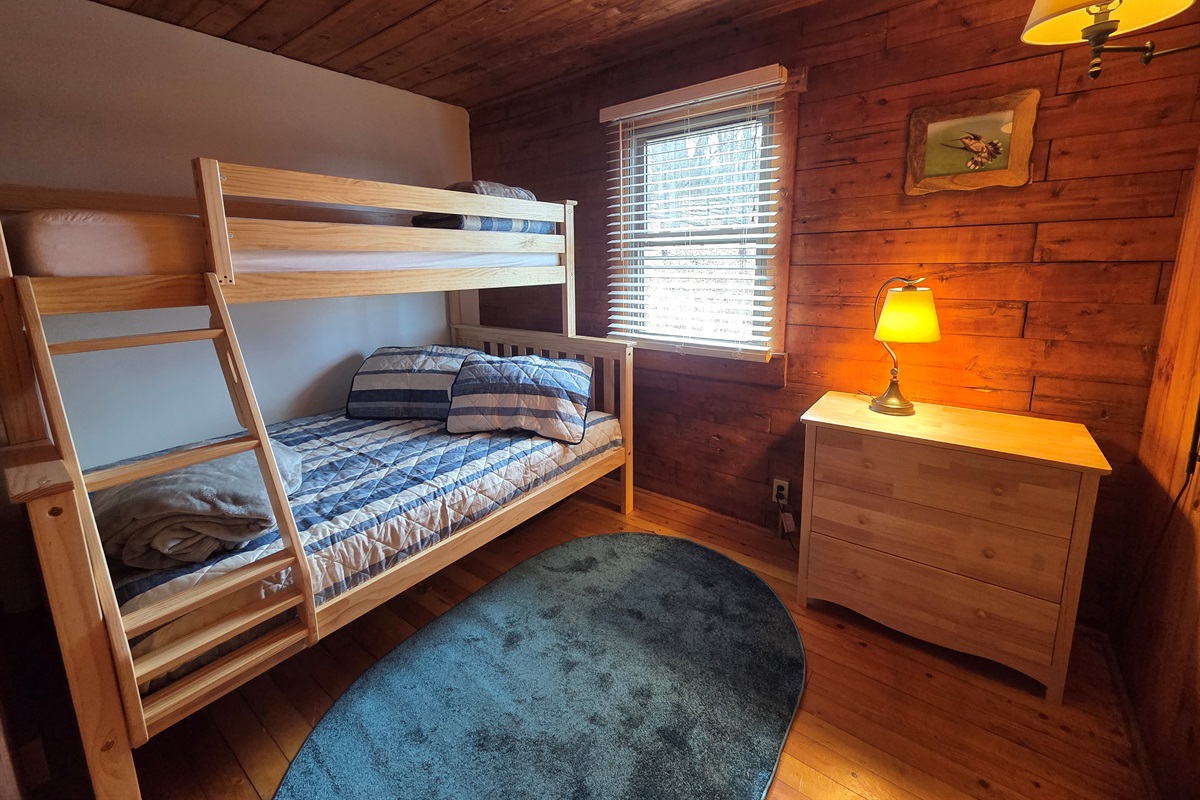 Bunk bedroom with a twin over a full-size bed