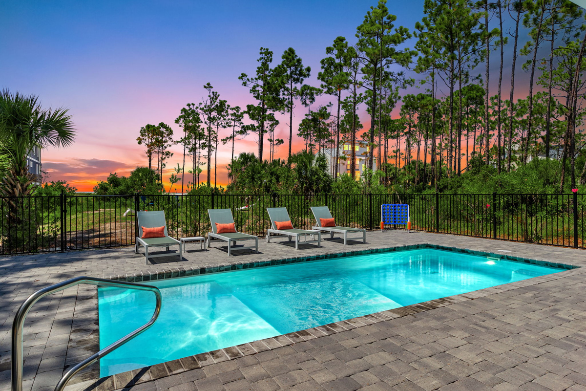 Spend the day at the beach, then return home for sunset swims in your private pool.