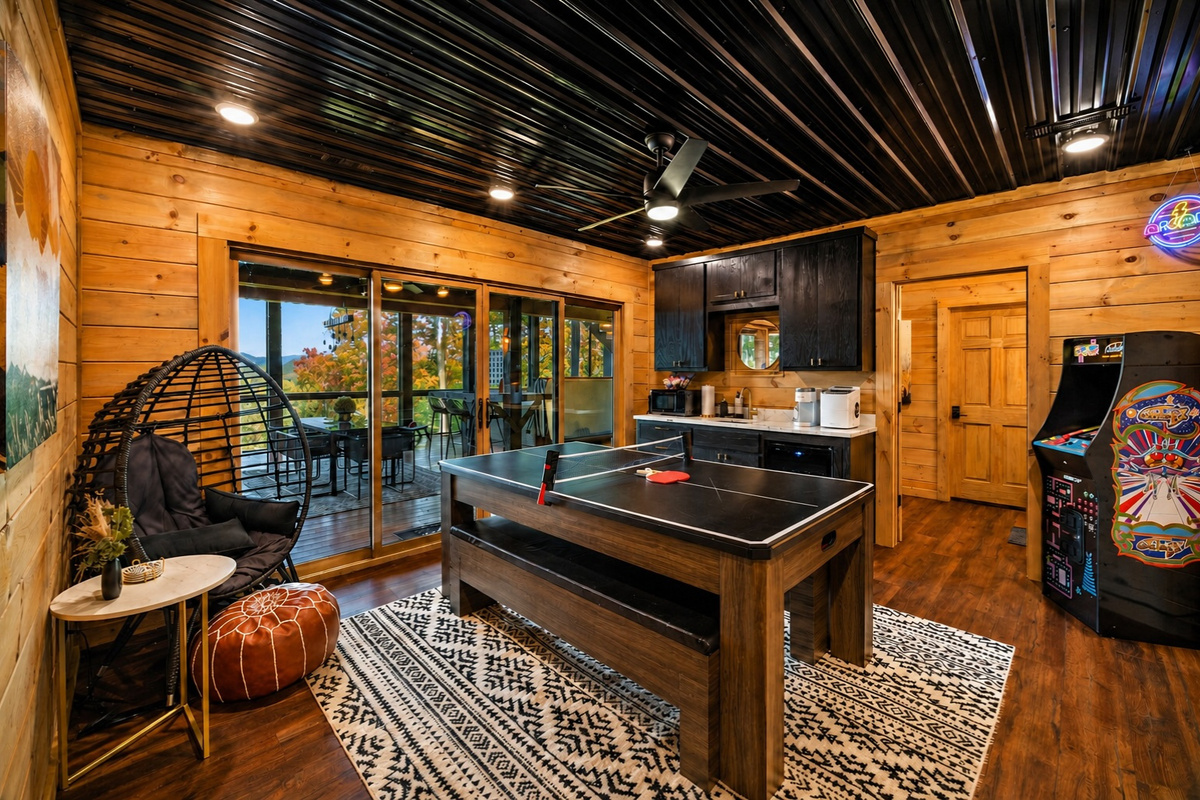 The ultimate hangout spot with a convertible ping pong & air hockey table, arcade game and board games all to keep the energy going.