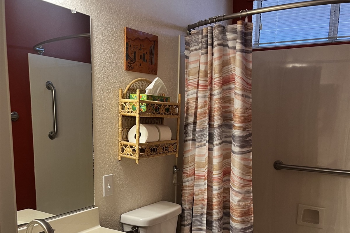 Guest Bathroom offers a tub shower combination
