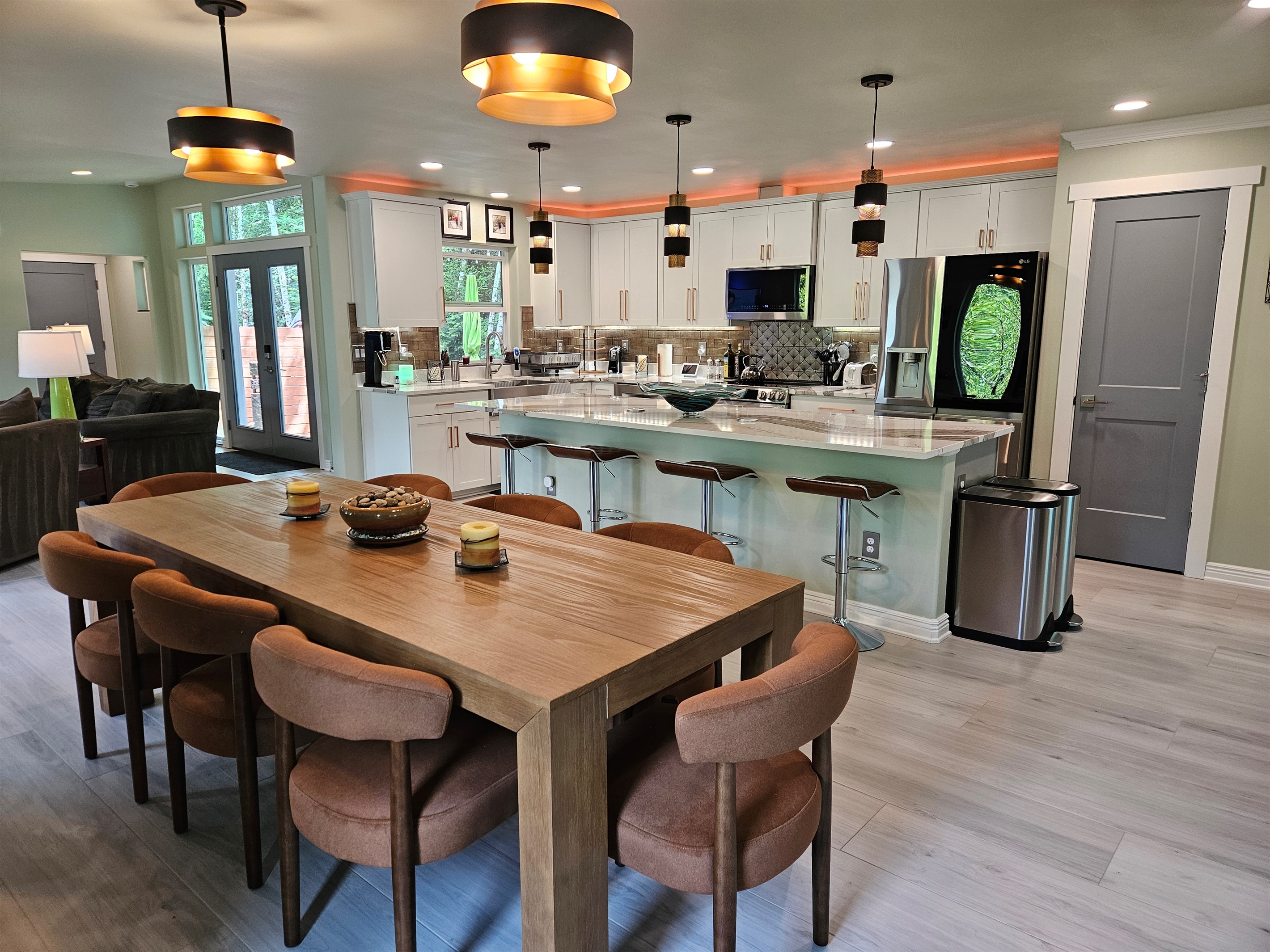 Kitchen includes microwave, dishwasher, oven, range, and refrigerator.