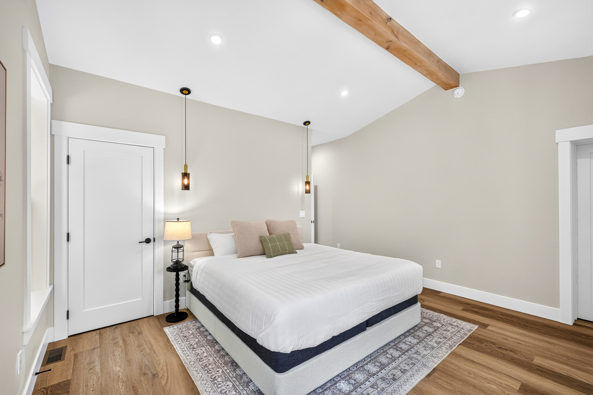 You'll sleep like a baby in this second floor primary suite with the hushed sounds of nature all around you.